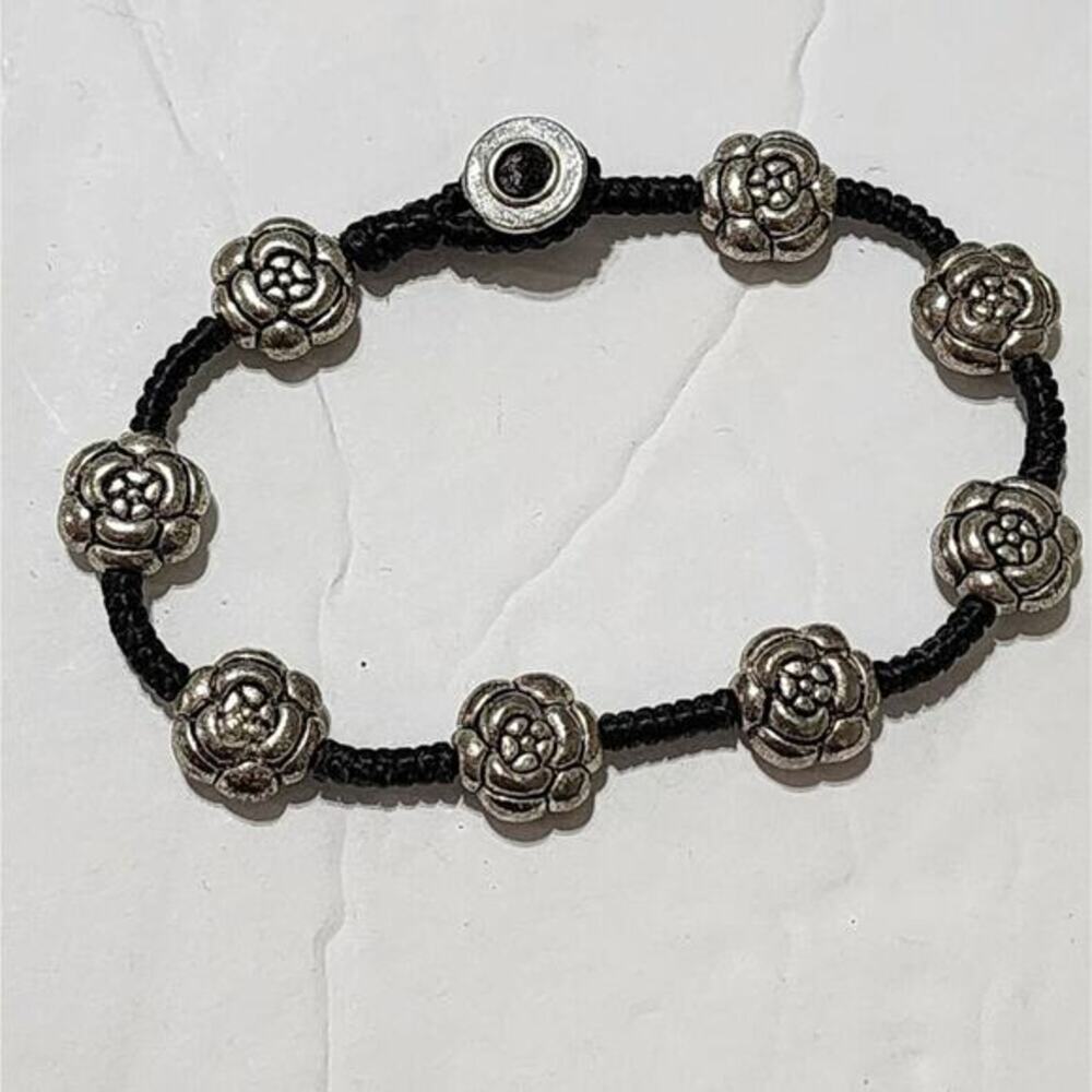 Gorgeous black leather and sober tone floral‎ rosettes bracelet